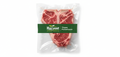 Vacuum-sealed T-bone porterhouse steak with product name and Harvest Prime Meats logo